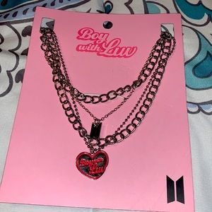 Boy with luv necklace